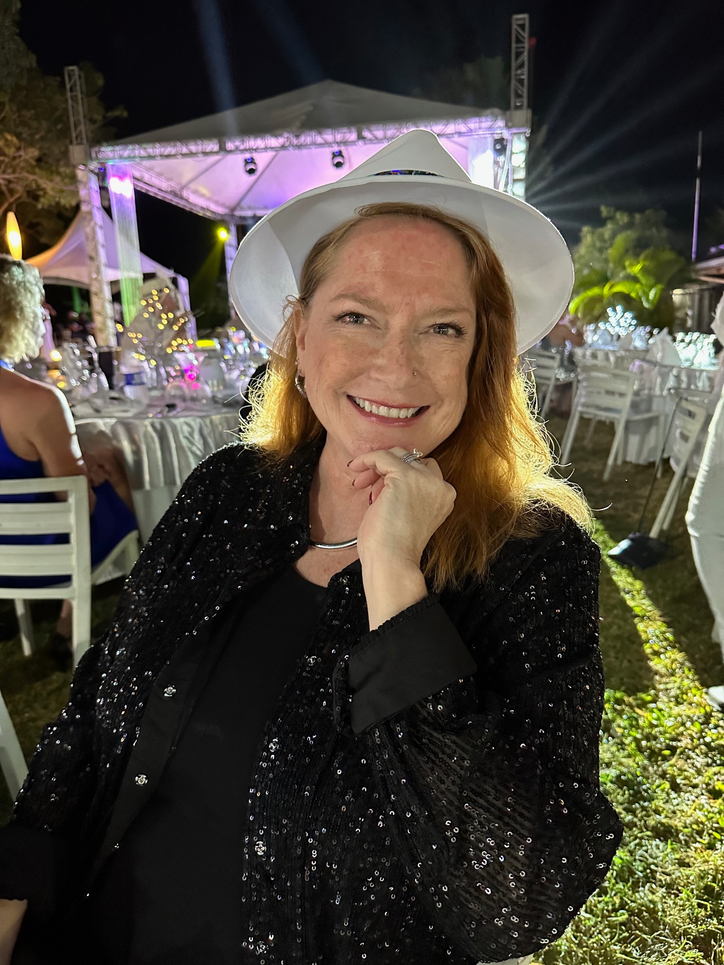 White hat at an outdoor party