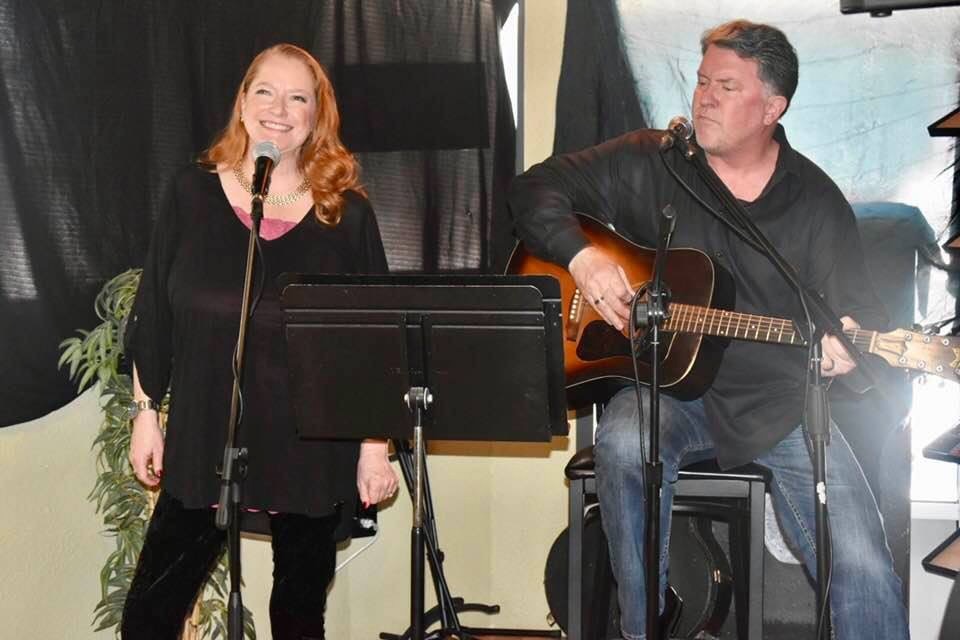 Performing together on stage