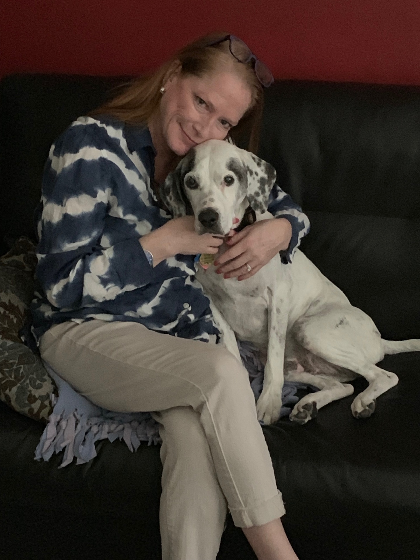 Snuggled up with our pup at home